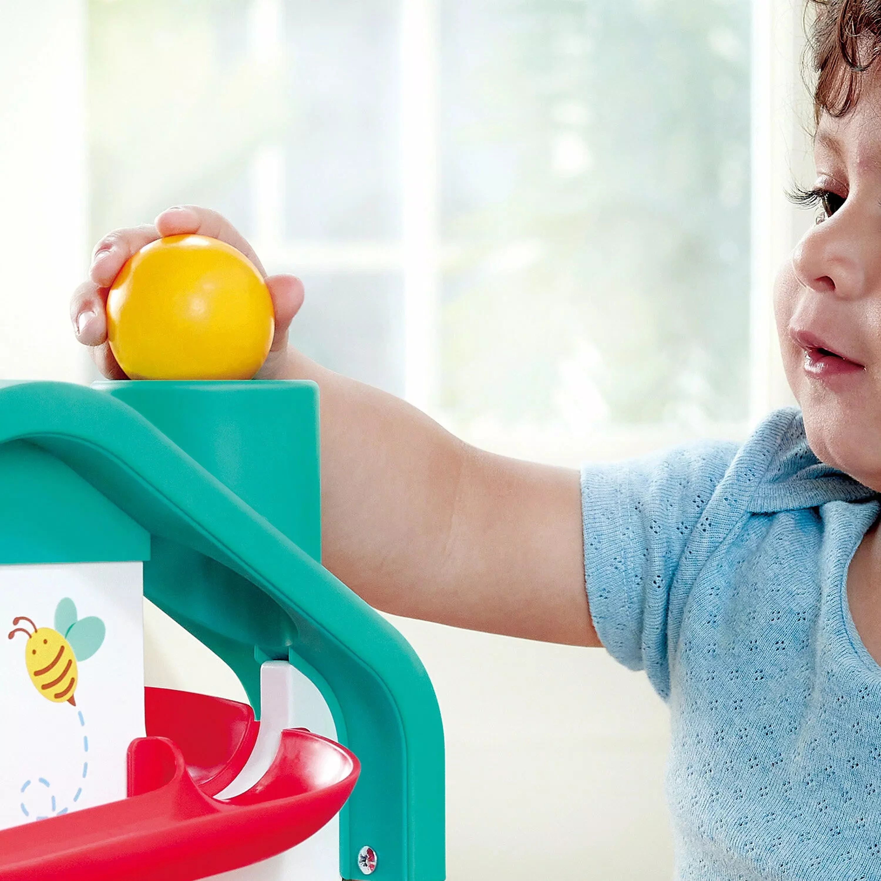 Игрушка развивающая «Горка для шариков» в виде домика, с ксилофоном